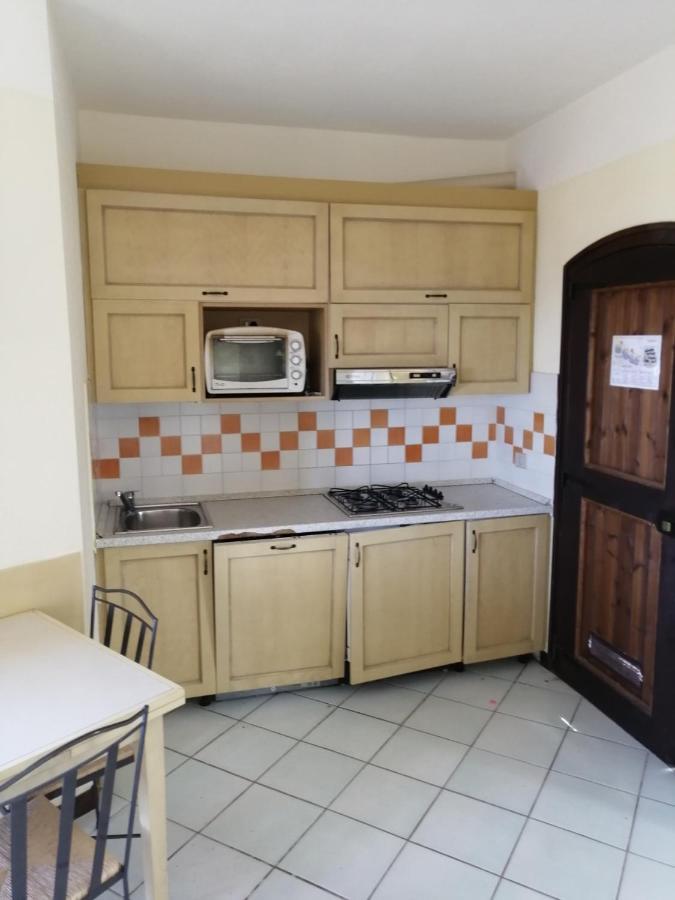 Rocciarossa Apartment Isola Rossa Bagian luar foto
