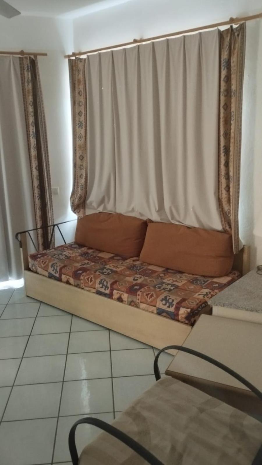 Rocciarossa Apartment Isola Rossa Bagian luar foto