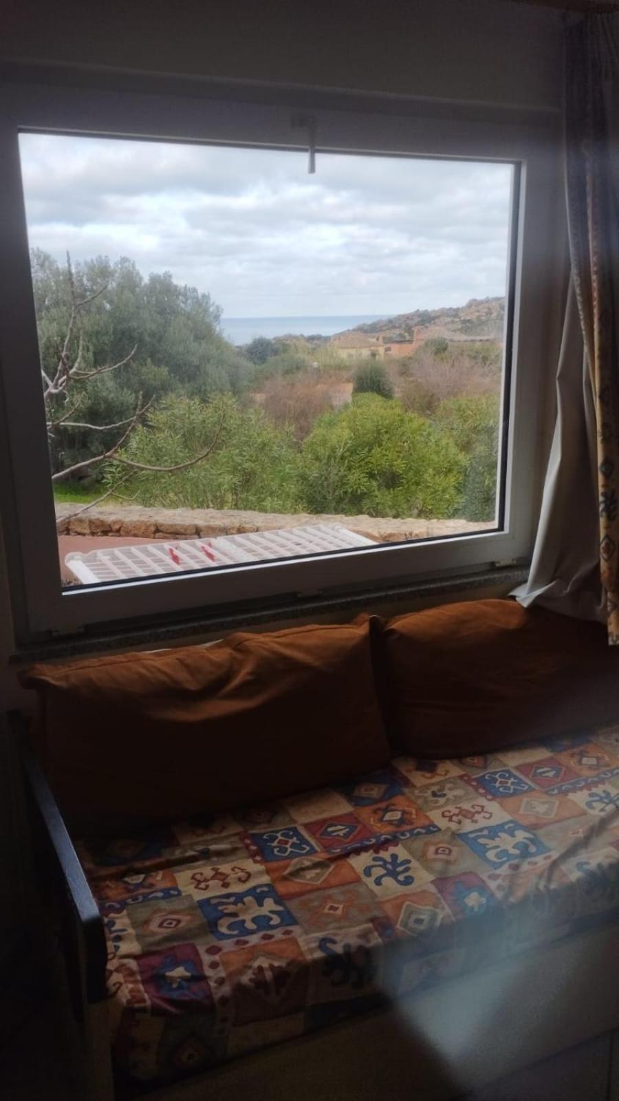 Rocciarossa Apartment Isola Rossa Bagian luar foto