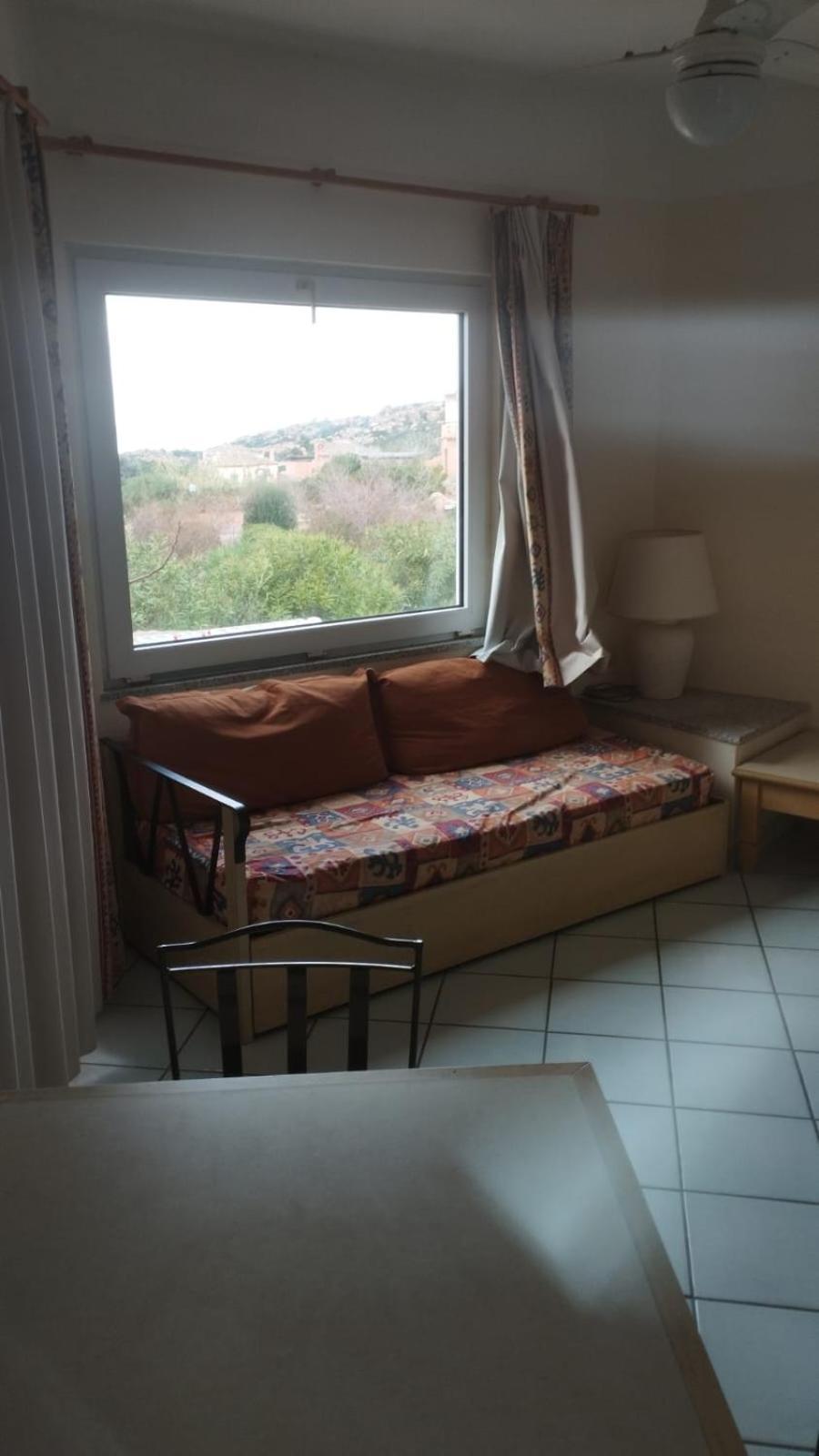 Rocciarossa Apartment Isola Rossa Bagian luar foto