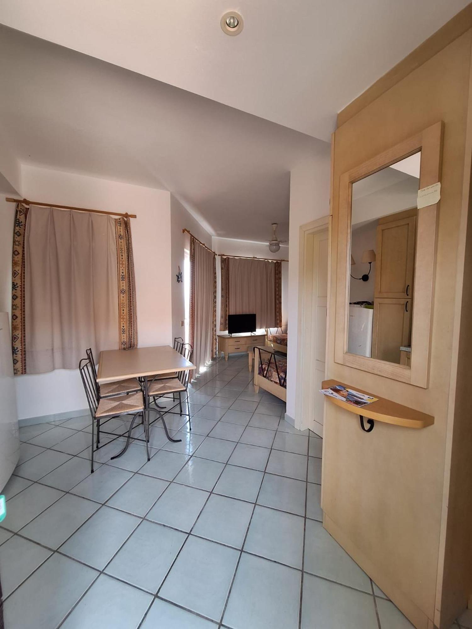 Rocciarossa Apartment Isola Rossa Bagian luar foto