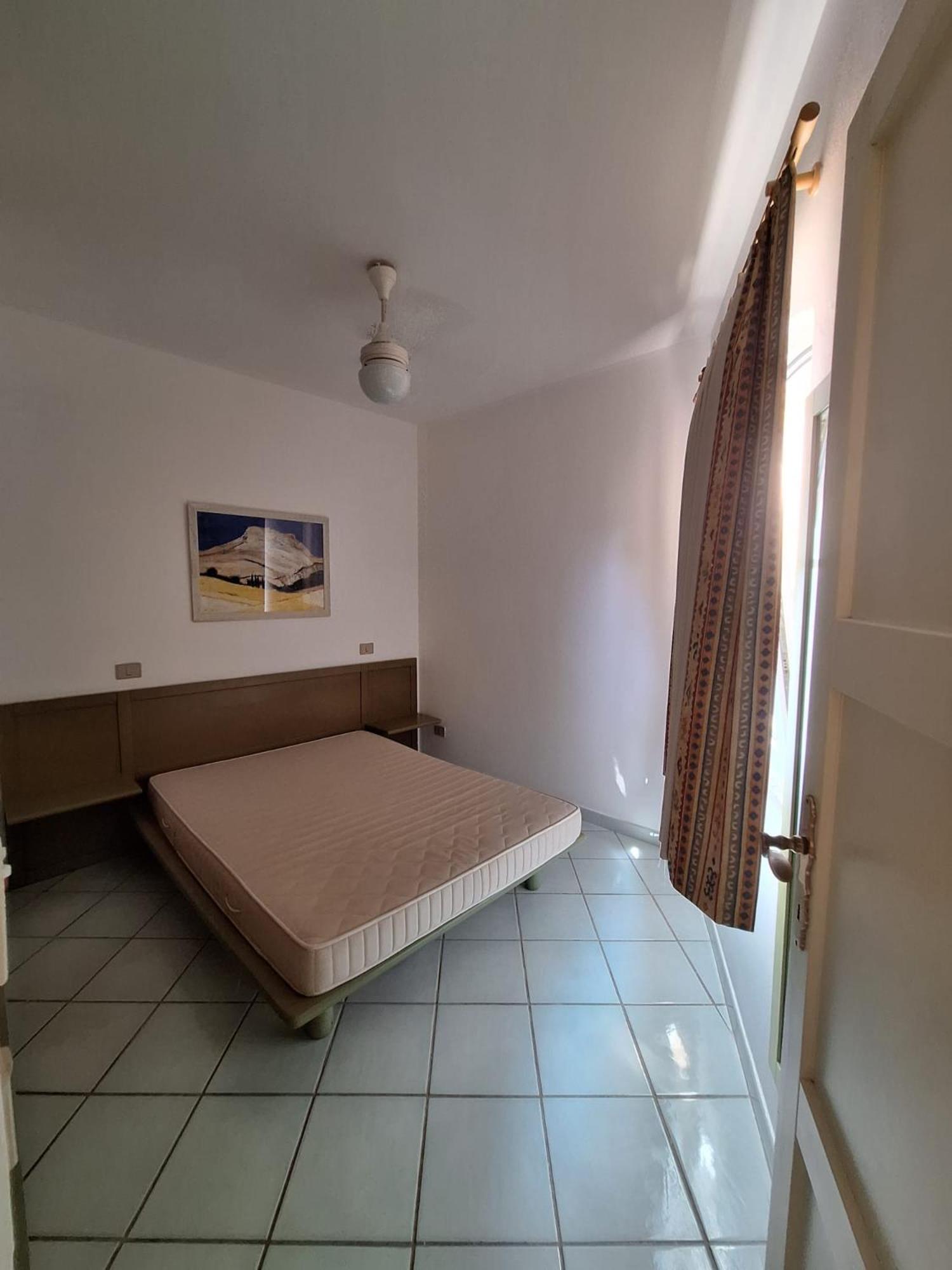 Rocciarossa Apartment Isola Rossa Bagian luar foto